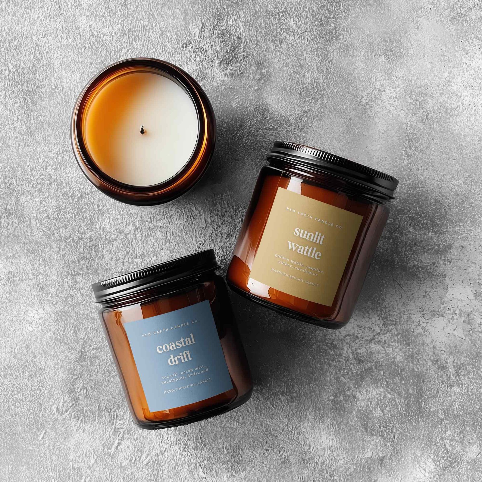A flat lay showing three candles from the Australiana Collection.